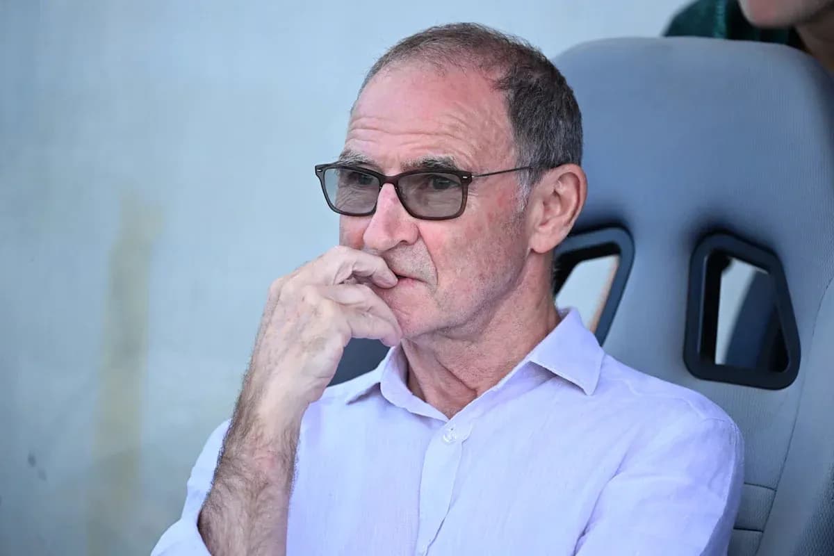 Person sitting on bench with glasses, deep in thought Person sitting on bench with glasses, deep in thought