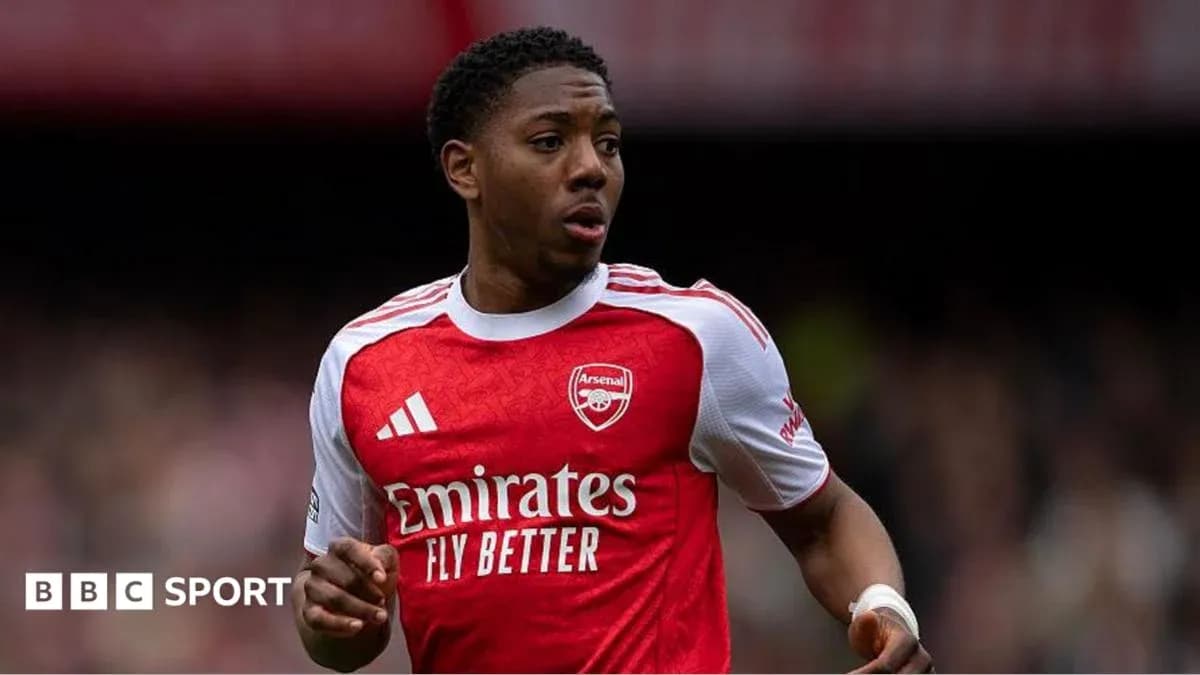 Arsenal player running during a match Arsenal player running during a match