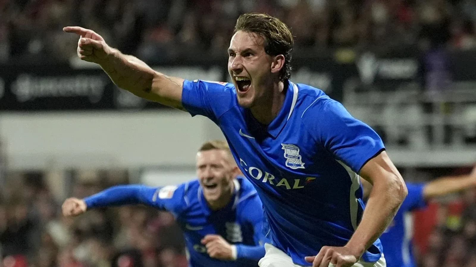 Birmingham City player celebrating a goal passionately Birmingham City player celebrating a goal passionately