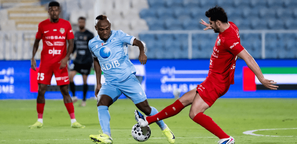 Al Wahda U23 player dribbling against Al Dhafra U23 Al Wahda U23 player dribbling against Al Dhafra U23