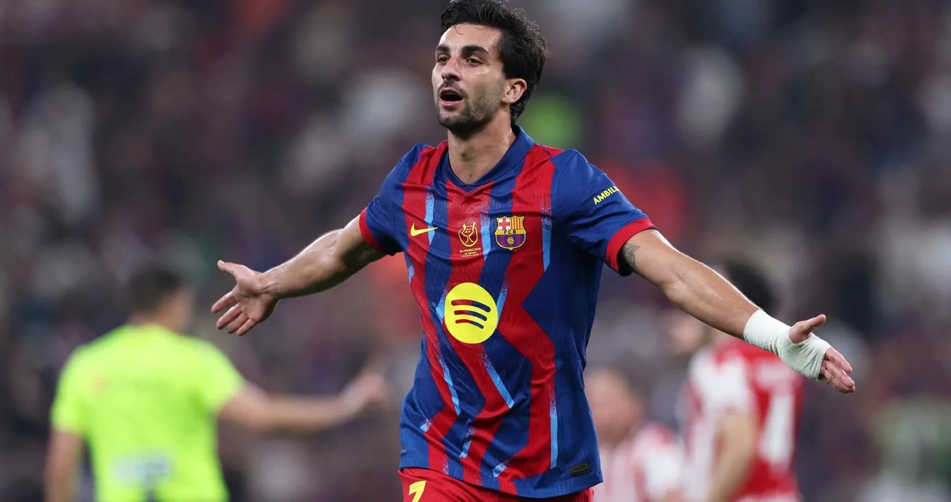 Player celebrating a goal during a match Player celebrating a goal during a match