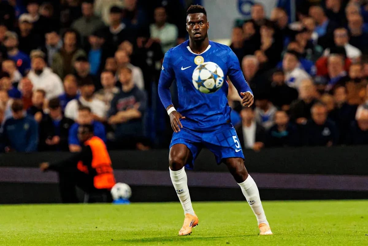 Player in blue kit controlling the ball during match Player in blue kit controlling the ball during match