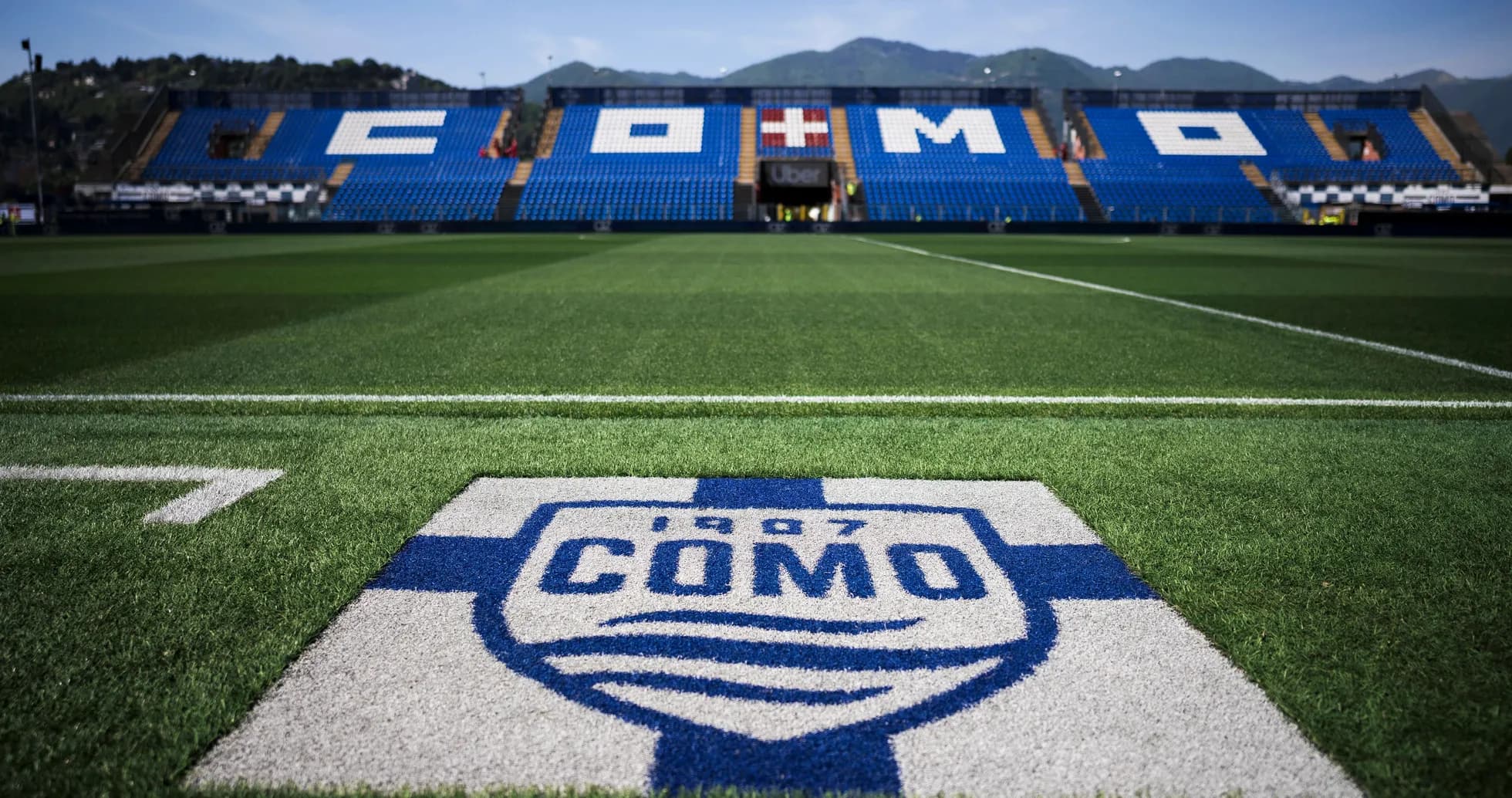 Como stadium with team logo on the pitch Como stadium with team logo on the pitch