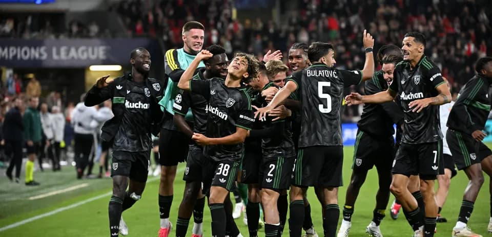 Players celebrating a goal during Champions League match Players celebrating a goal during Champions League match