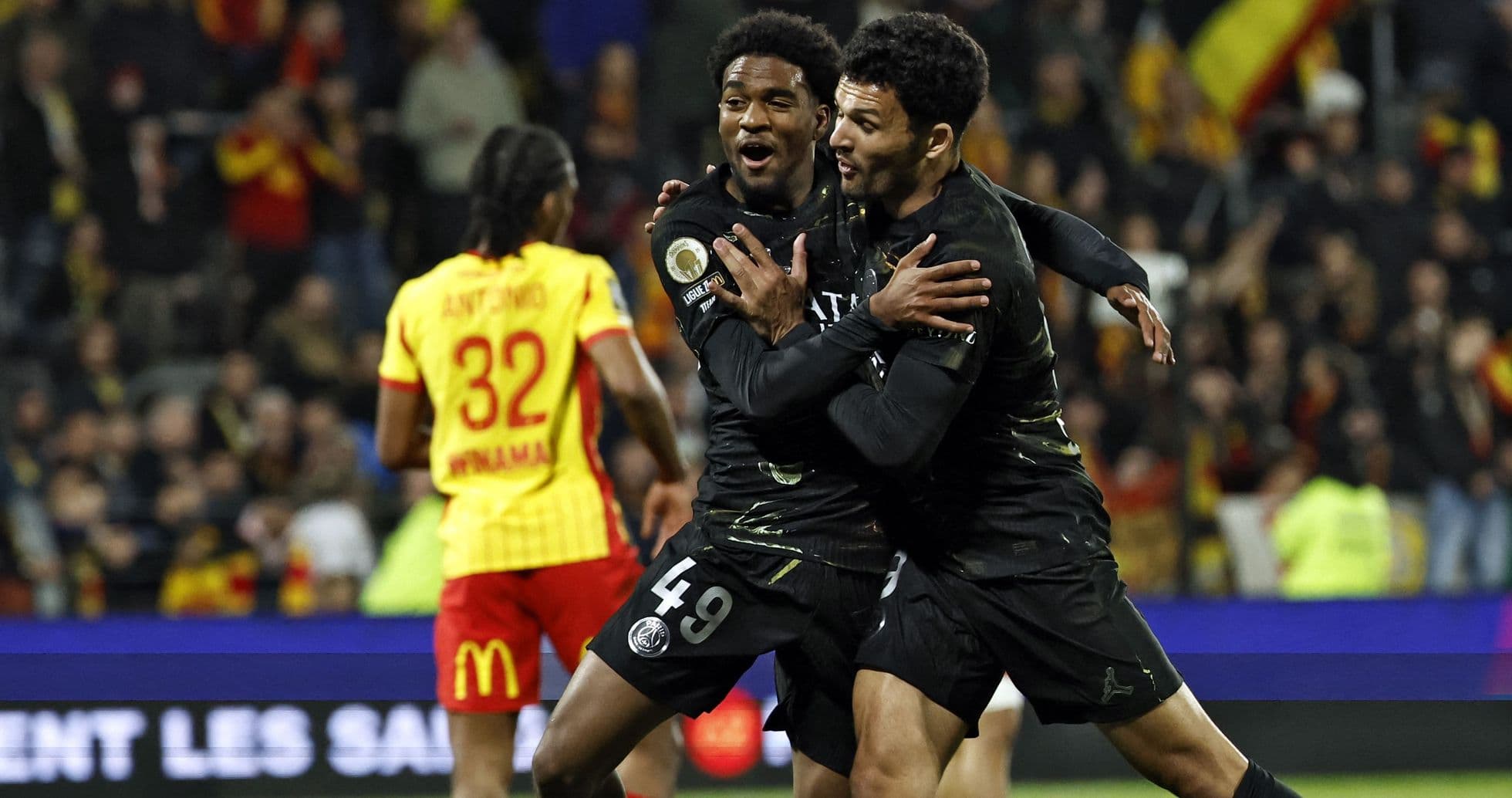 PSG players celebrating a goal during a match PSG players celebrating a goal during a match