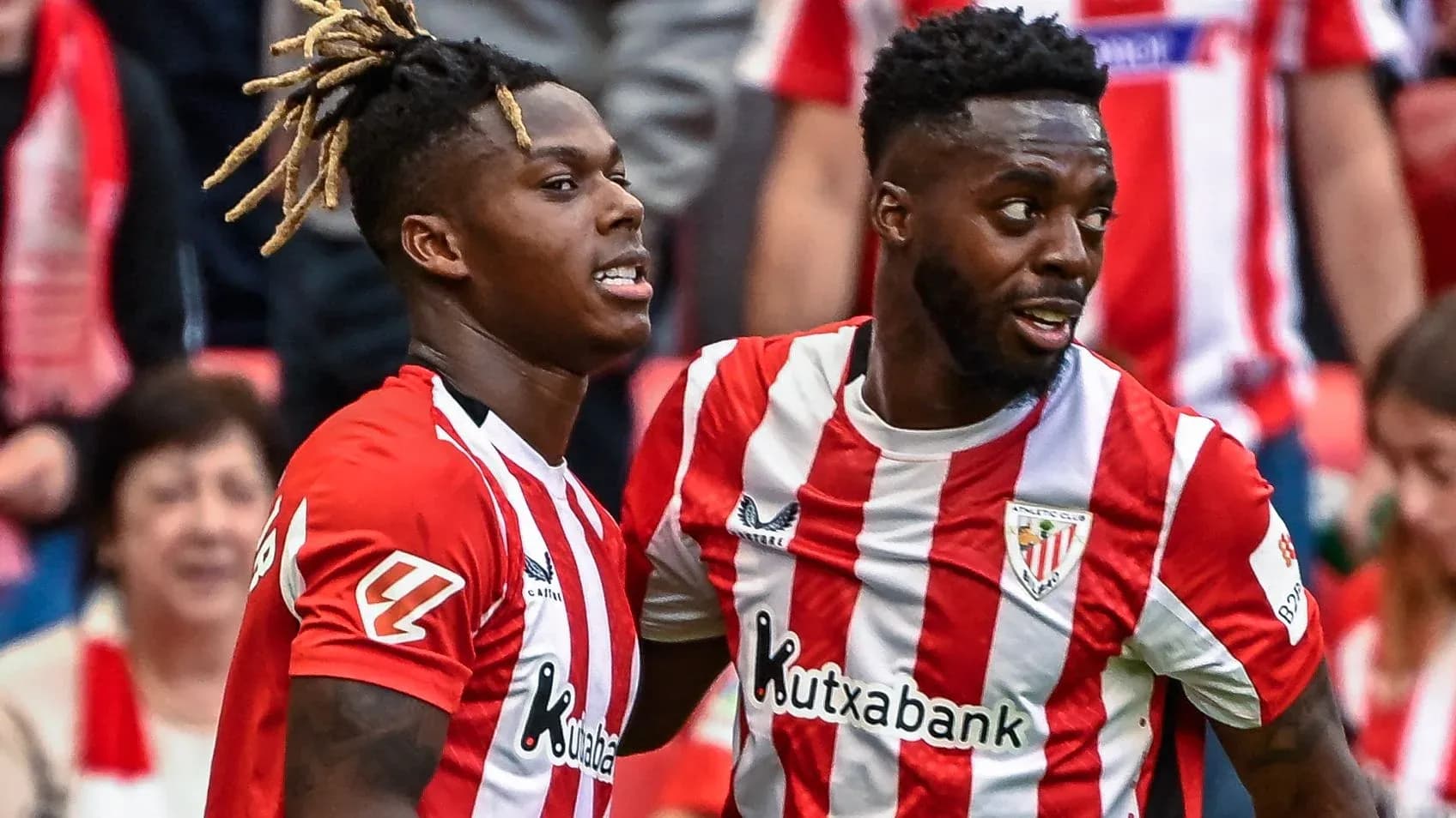 Two Athletic Club players celebrating a goal together Two Athletic Club players celebrating a goal together