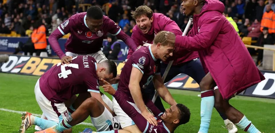 Burnley players celebrating a goal during match Burnley players celebrating a goal during match