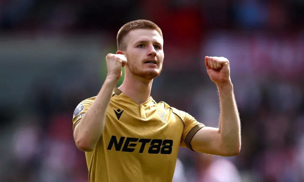 Player celebrating with raised fists after match Player celebrating with raised fists after match