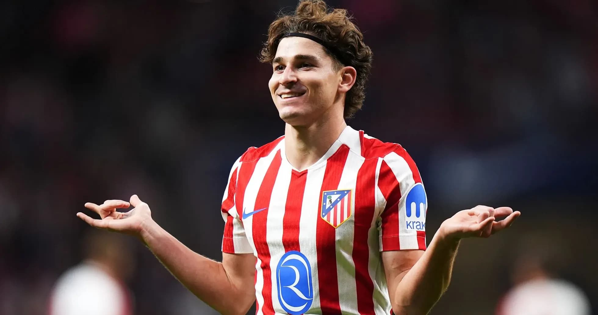 Atletico Madrid player celebrating during a match Atletico Madrid player celebrating during a match