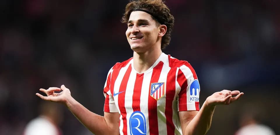 Atletico Madrid player celebrating during a match Atletico Madrid player celebrating during a match