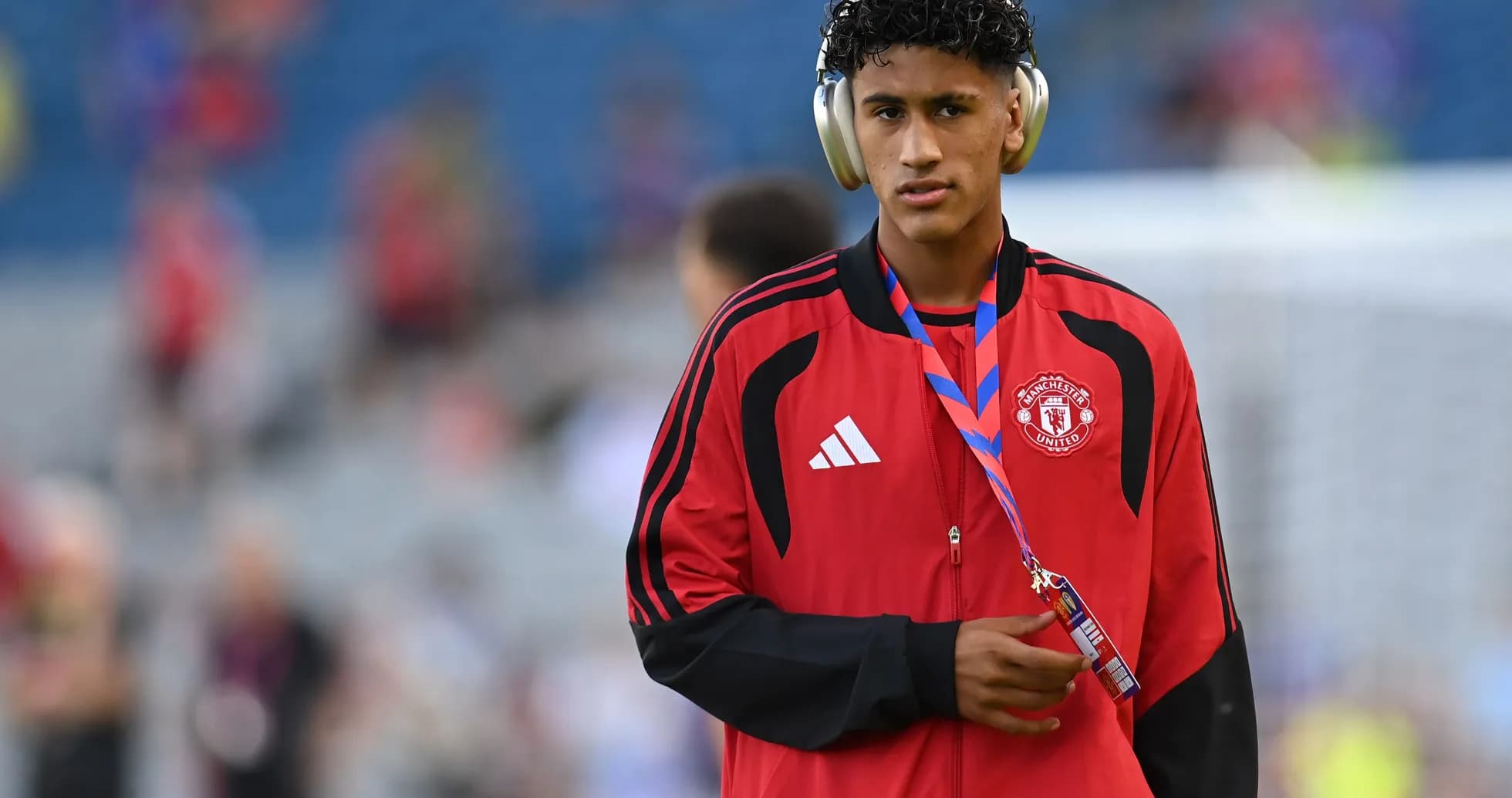 Player wearing headphones in Manchester United tracksuit Player wearing headphones in Manchester United tracksuit