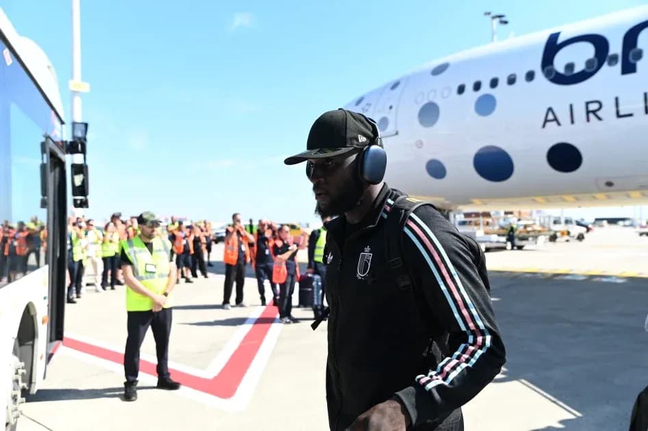 Player arriving at airport near aircraft Player arriving at airport near aircraft