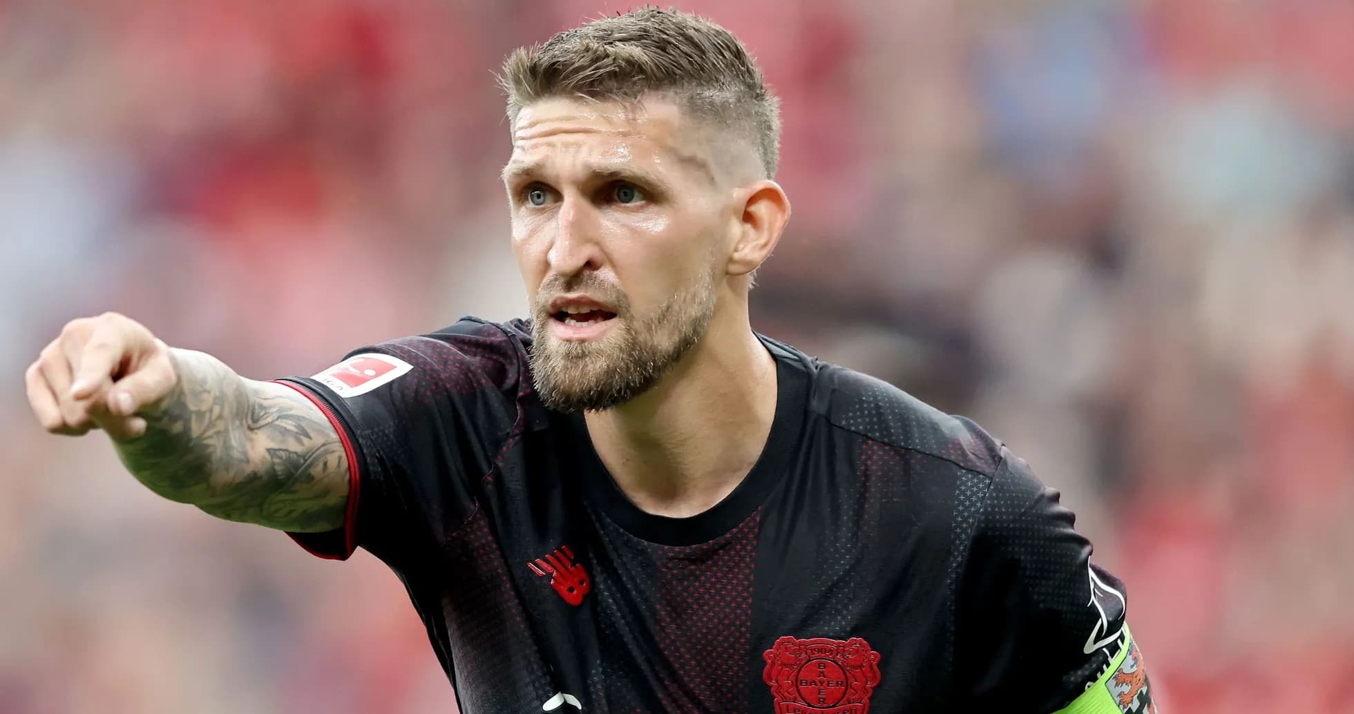 Player pointing during a match for Bayer Leverkusen Player pointing during a match for Bayer Leverkusen