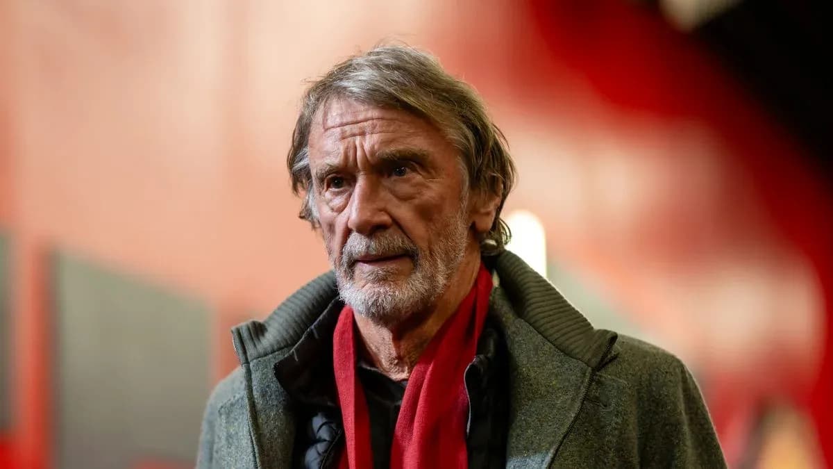 Man with gray hair wearing a scarf indoors Man with gray hair wearing a scarf indoors