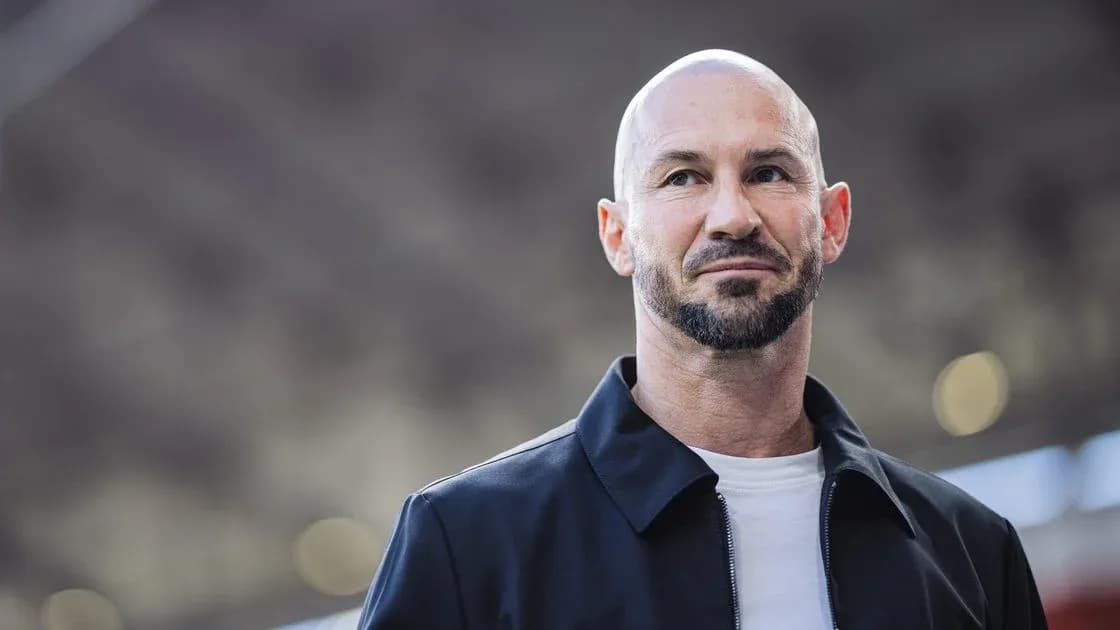 Man with beard and bald head standing outdoors Man with beard and bald head standing outdoors