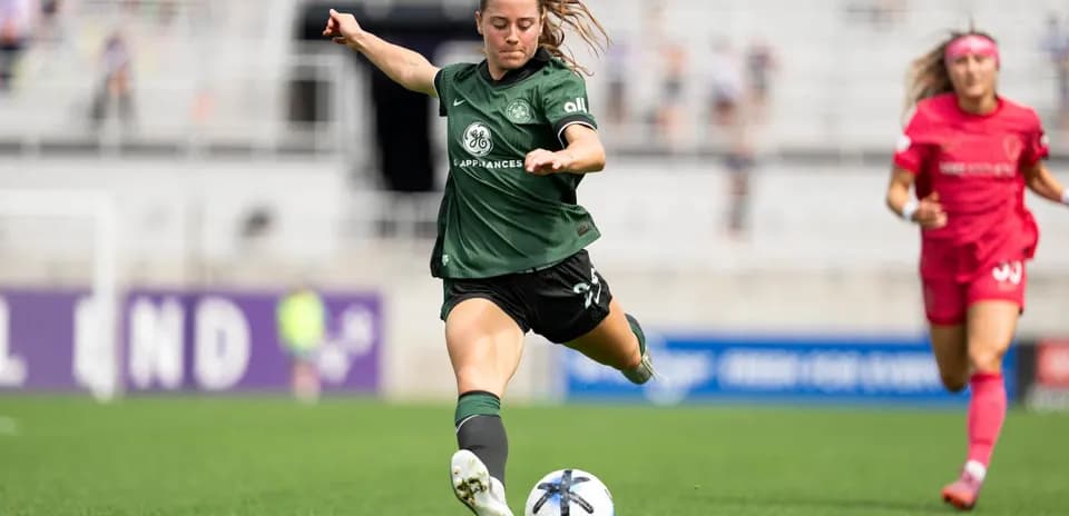 Player kicking the ball during NWSL match Player kicking the ball during NWSL match