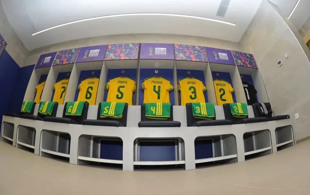 Changing room with yellow jerseys for players Changing room with yellow jerseys for players