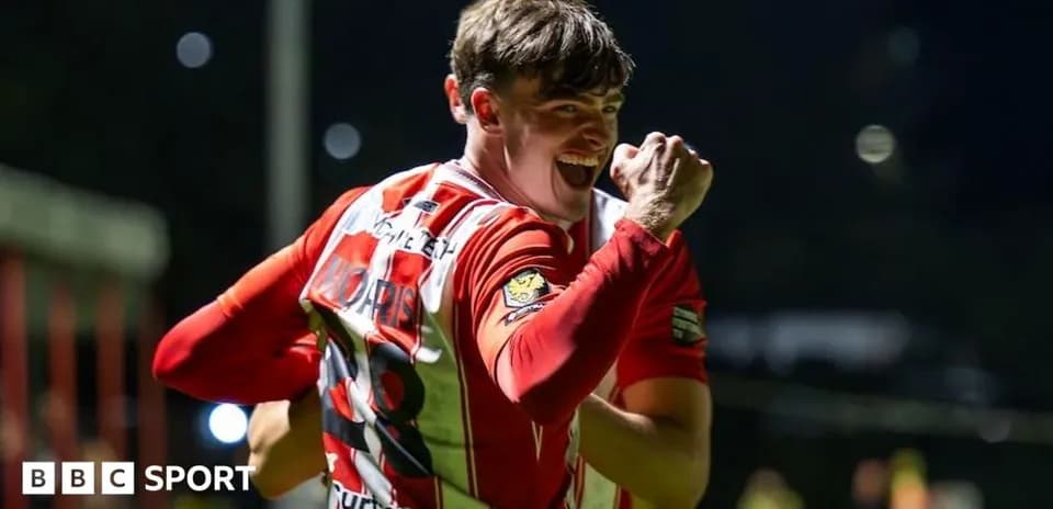 Player celebrating a goal with clenched fist Player celebrating a goal with clenched fist