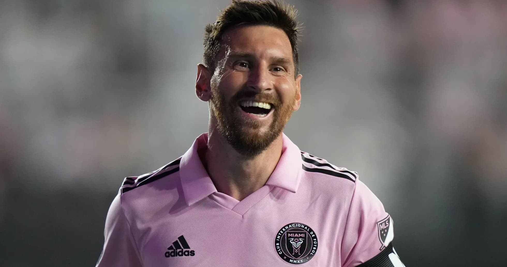 Player in pink jersey smiling during match Player in pink jersey smiling during match
