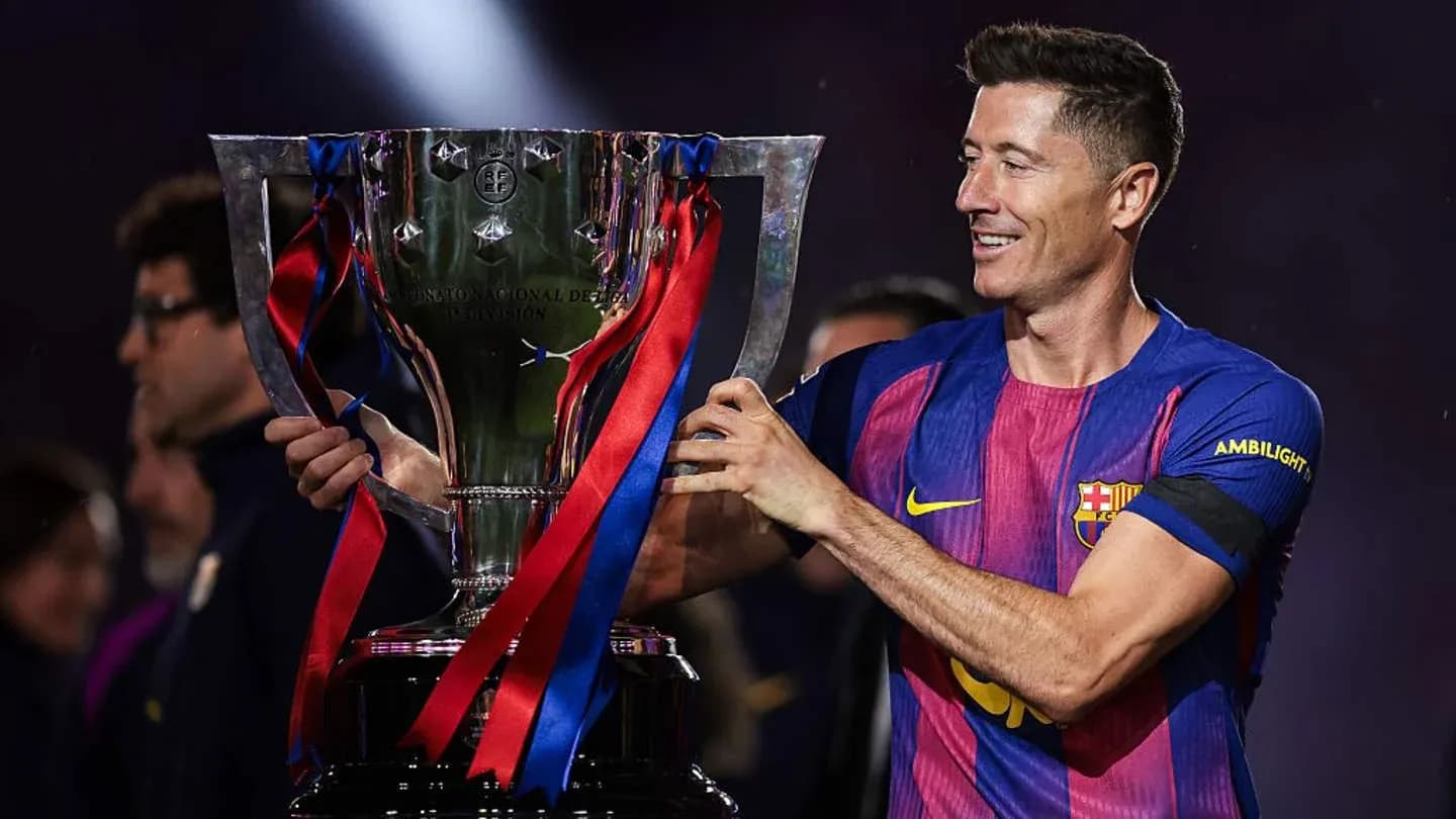 Player holding trophy after winning the match Player holding trophy after winning the match
