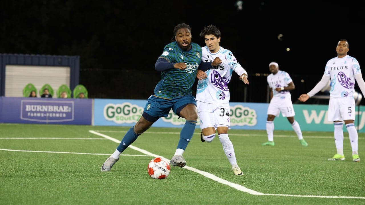 Player dribbling the ball during Pacific FC match Player dribbling the ball during Pacific FC match