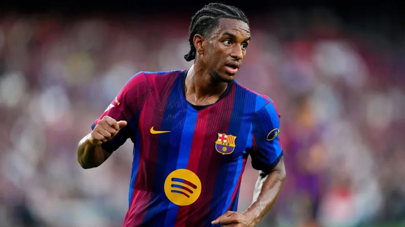 Player in FC Barcelona jersey running on the field Player in FC Barcelona jersey running on the field