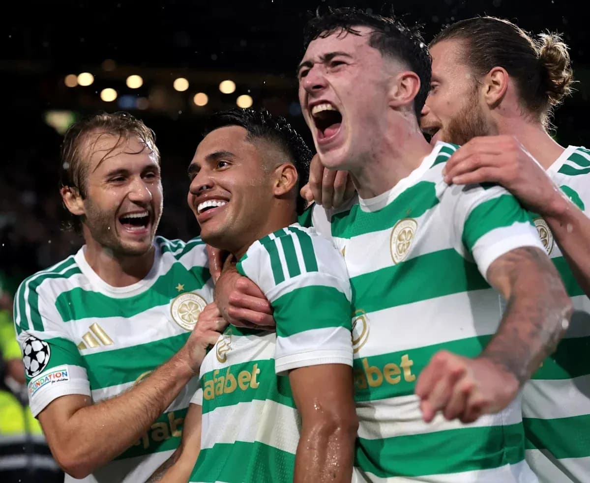 Celtic players celebrating a goal during match Celtic players celebrating a goal during match