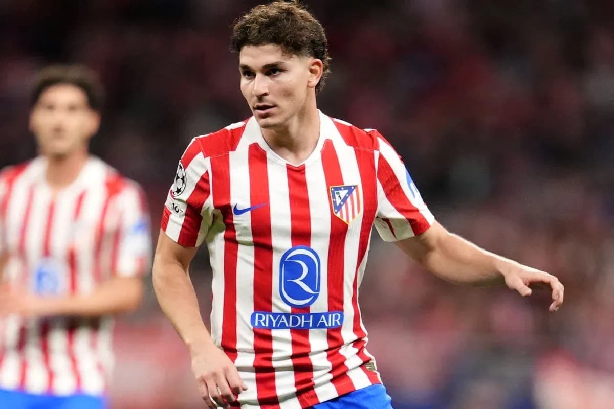 Atletico Madrid player in red and white jersey Atletico Madrid player in red and white jersey