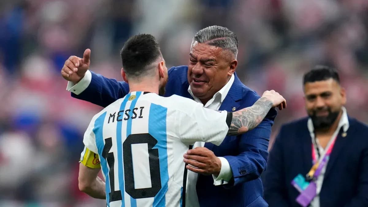 Lionel Messi embracing a team official after match Lionel Messi embracing a team official after match