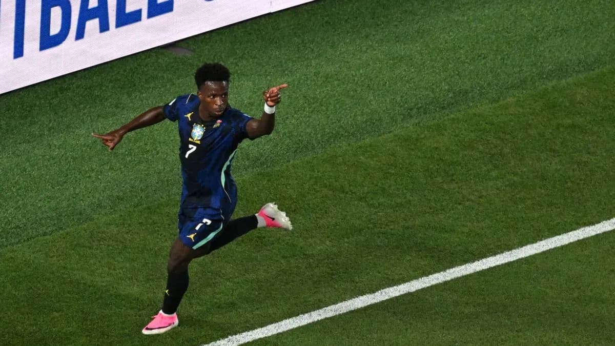 Player celebrating a goal on the pitch Player celebrating a goal on the pitch