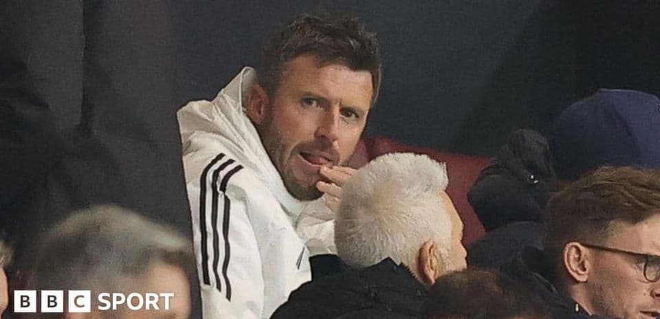 Coach observing the match from the stands Coach observing the match from the stands