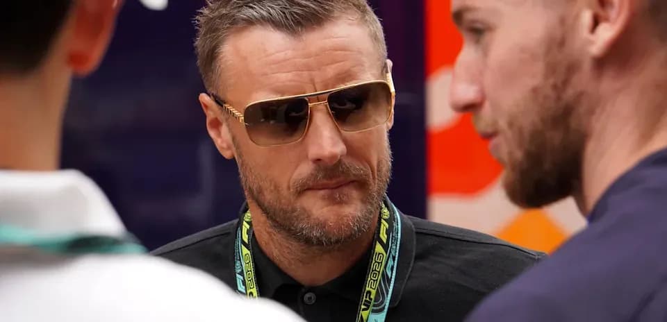 Man in sunglasses talking with two others Man in sunglasses talking with two others