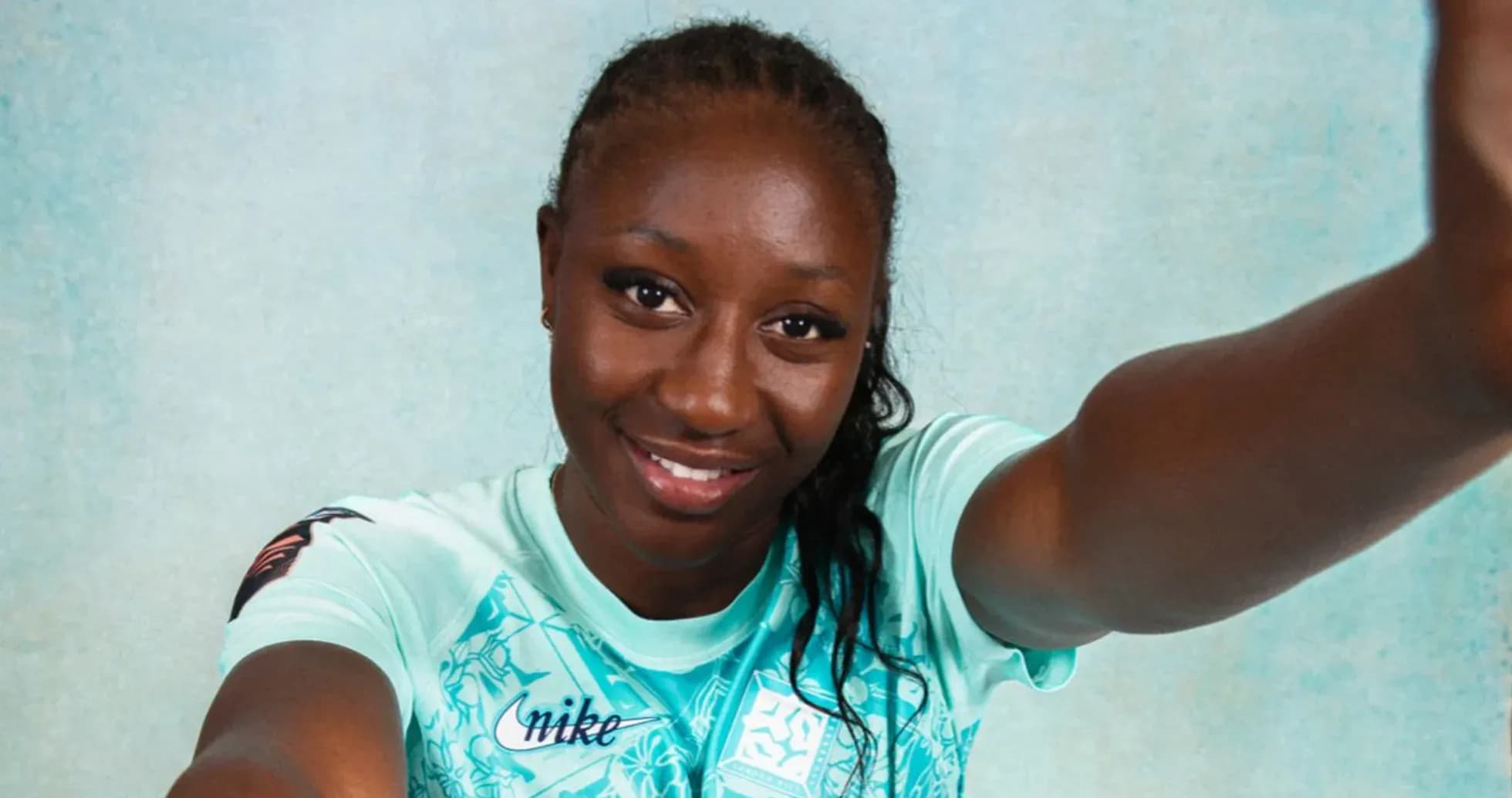 Athlete posing for a photo in sportswear Athlete posing for a photo in sportswear