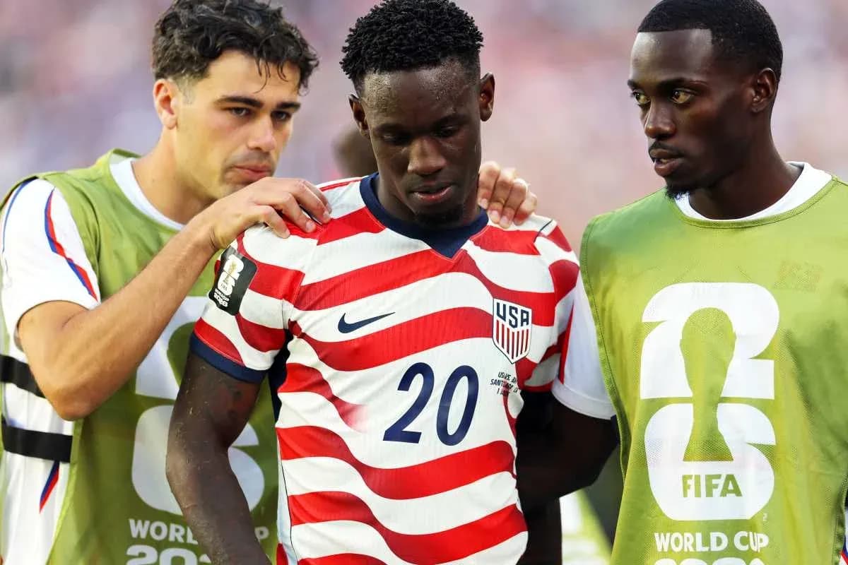 USA players supporting teammate during World Cup match USA players supporting teammate during World Cup match