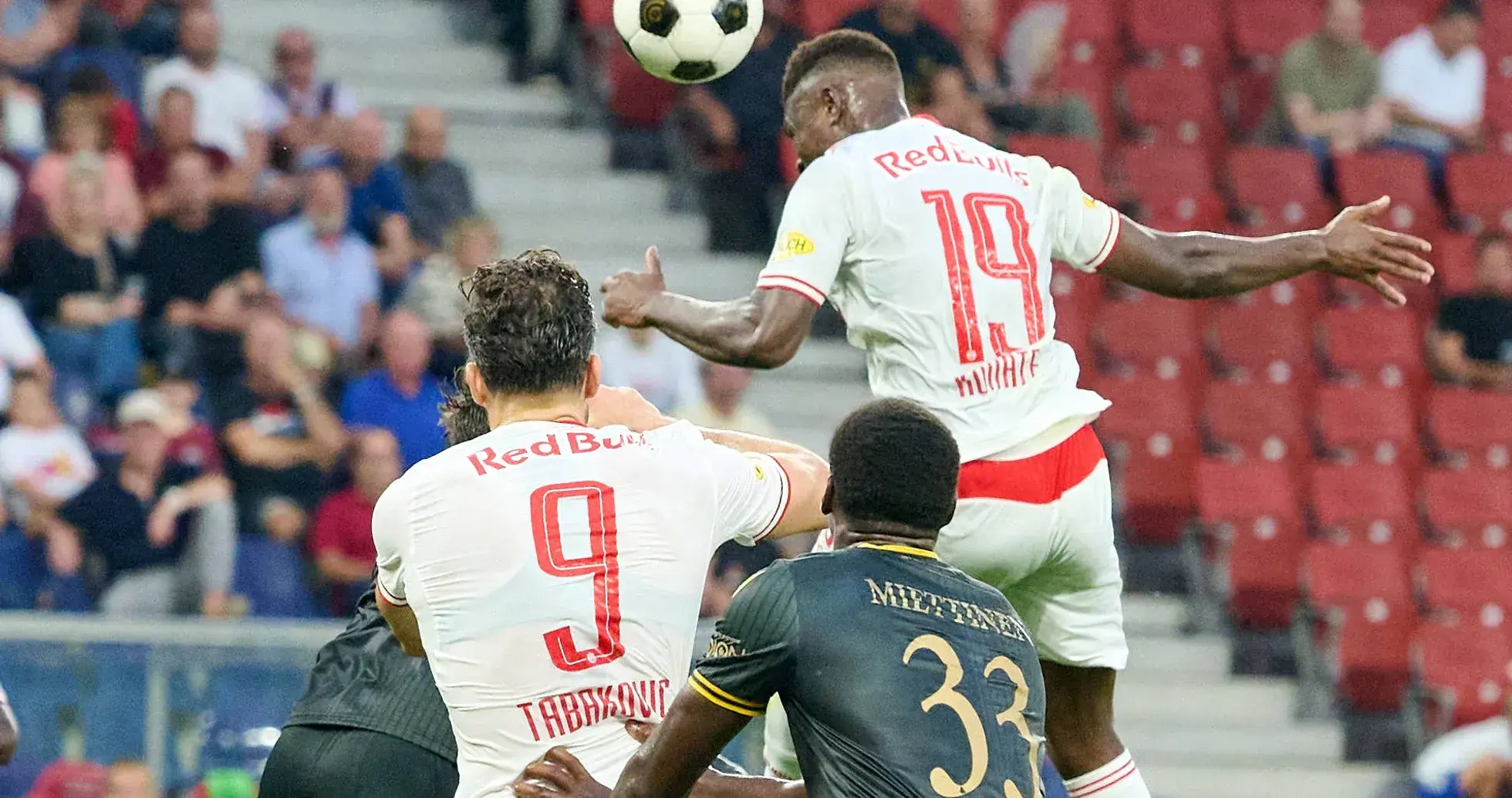 Red Bull Salzburg player heading the ball Red Bull Salzburg player heading the ball