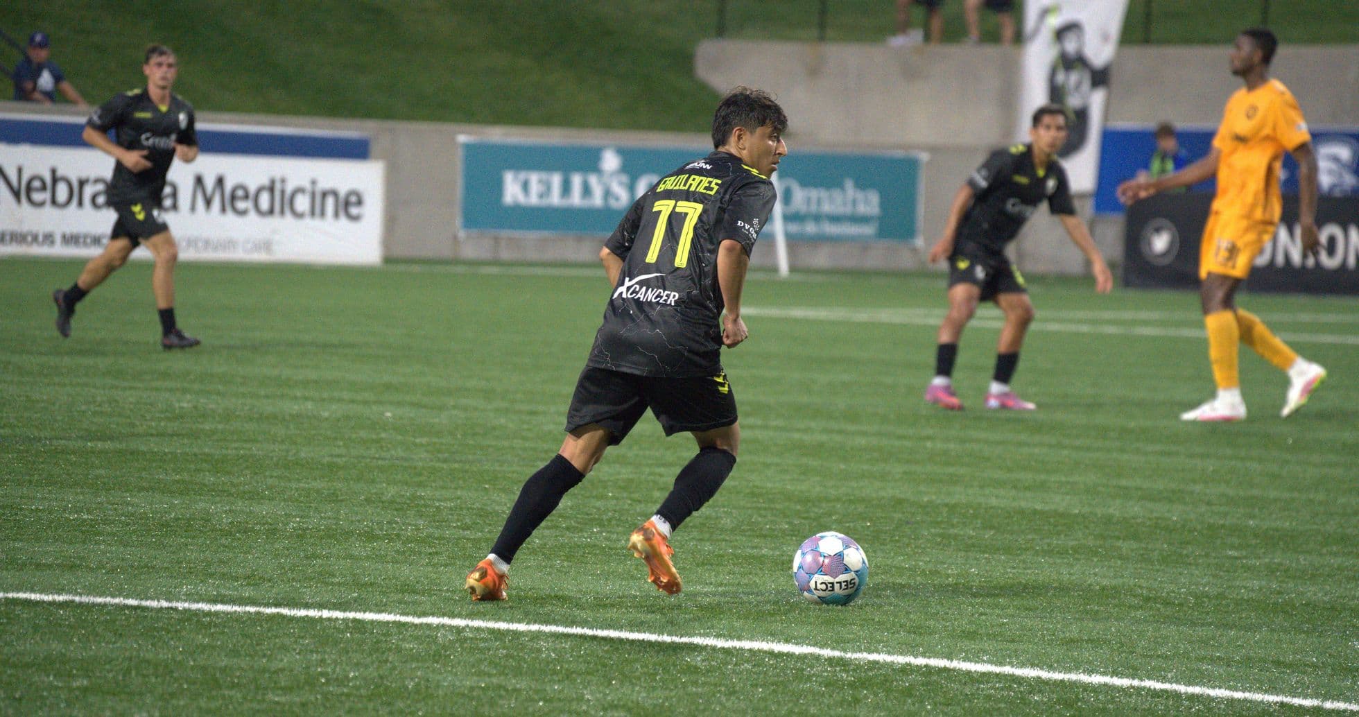 Player dribbling the ball in USL match Player dribbling the ball in USL match
