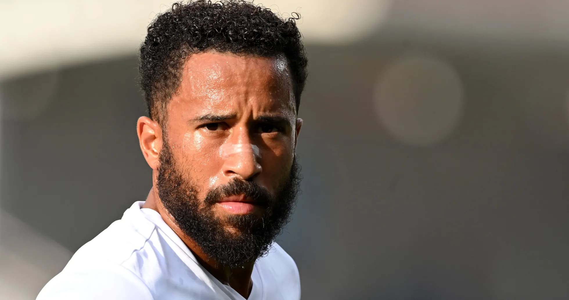Player with beard and bandage on nose in training Player with beard and bandage on nose in training