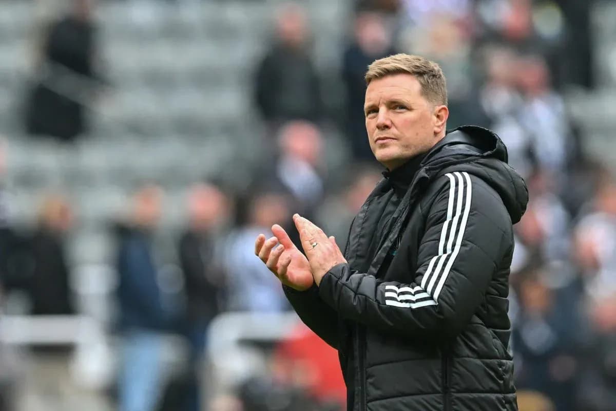 Coach applauding fans during match at stadium Coach applauding fans during match at stadium