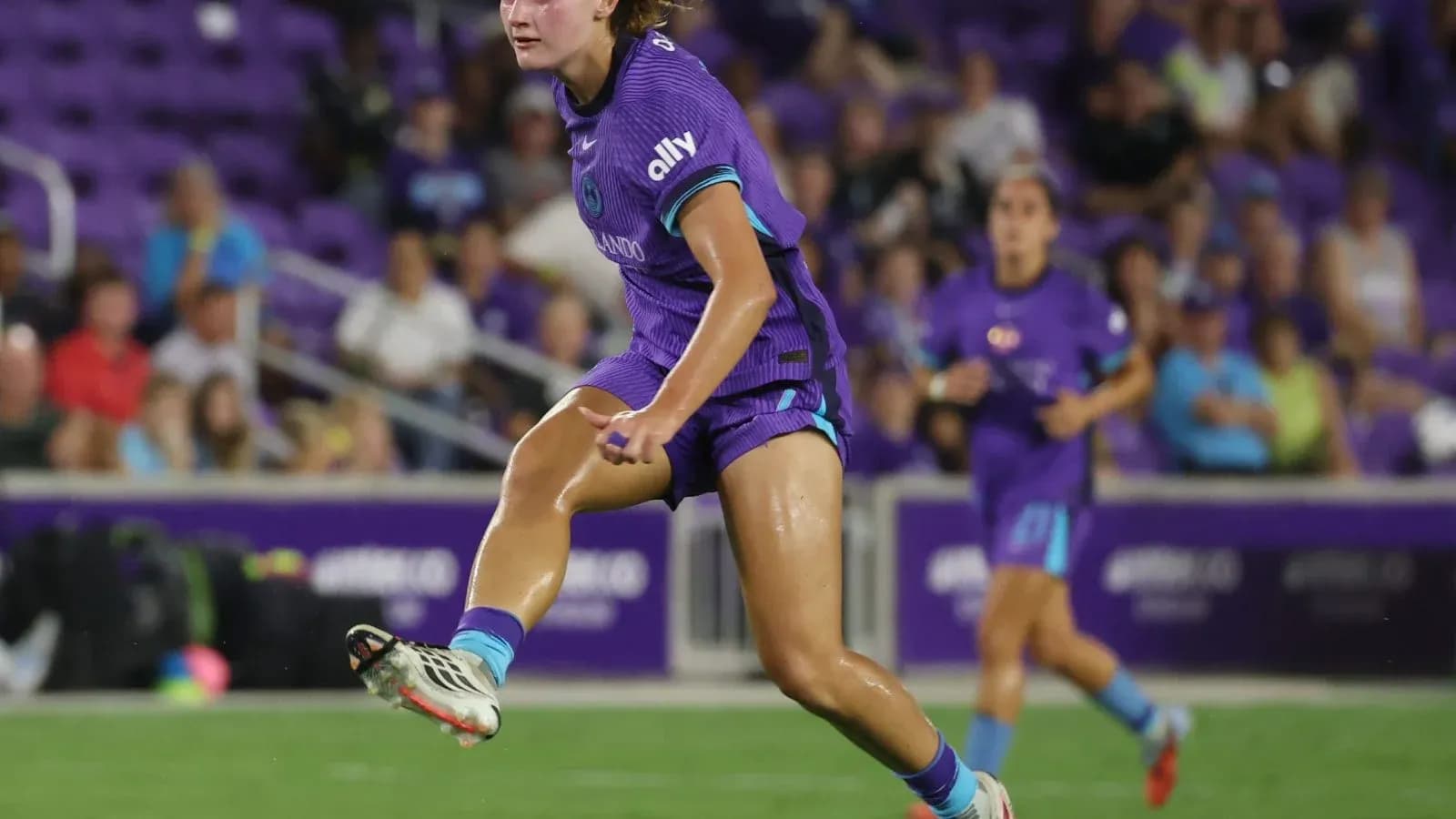 Orlando Pride player in action during match Orlando Pride player in action during match