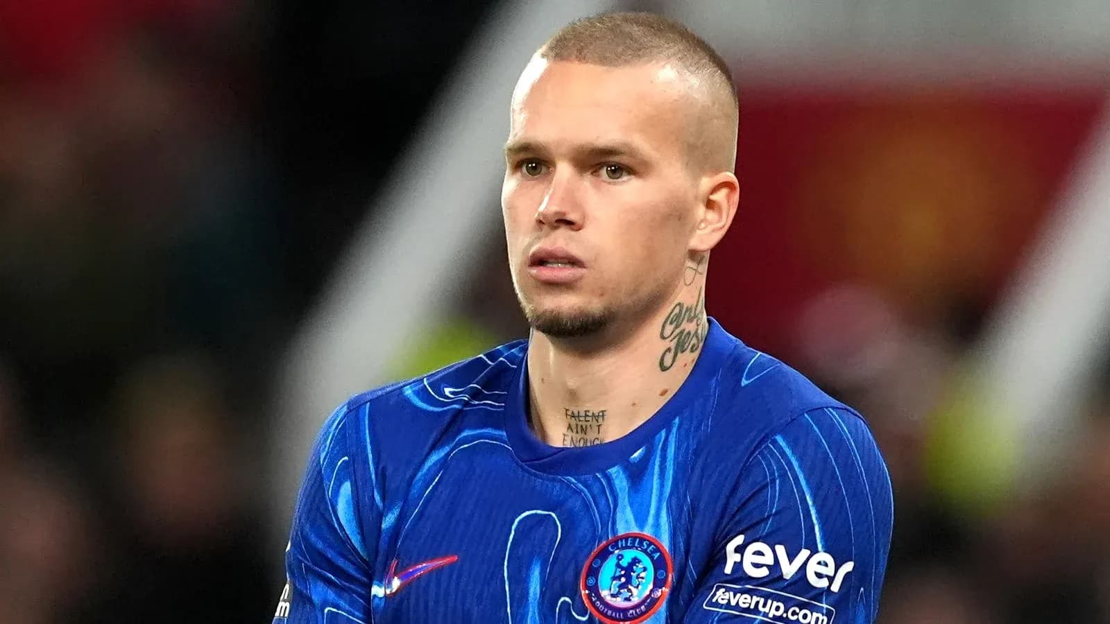 Chelsea player in blue kit during match Chelsea player in blue kit during match