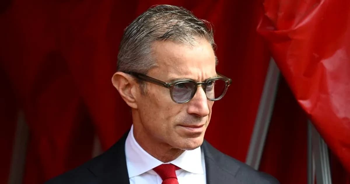 Man in glasses wearing a suit with red tie Man in glasses wearing a suit with red tie