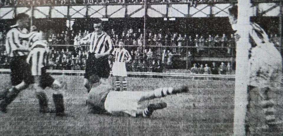 Player falling down during historical football match Player falling down during historical football match