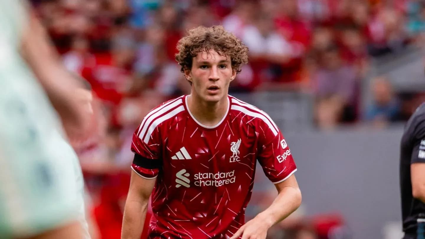 Player in red Liverpool kit during match action Player in red Liverpool kit during match action