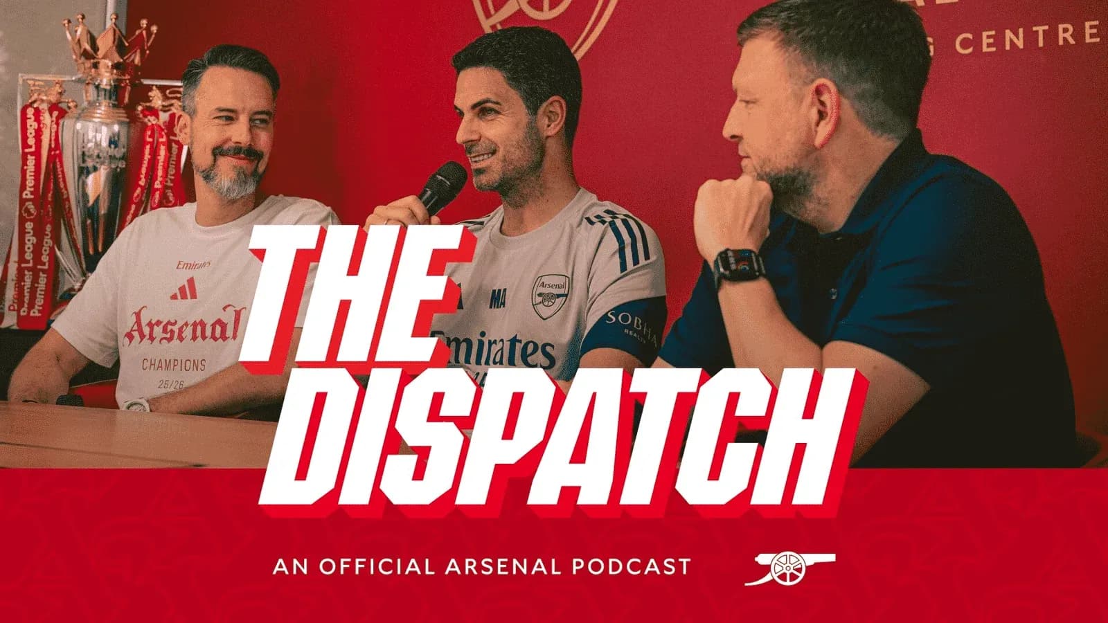Podcast hosts discussing Arsenal in front of trophies Podcast hosts discussing Arsenal in front of trophies