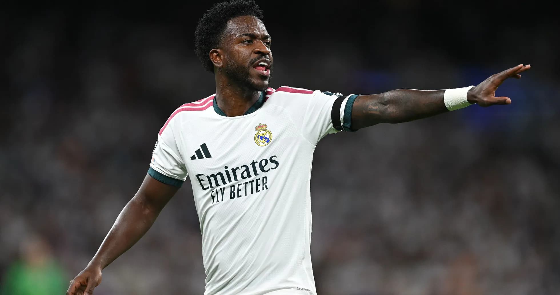 Player gesturing during match wearing Real Madrid jersey Player gesturing during match wearing Real Madrid jersey