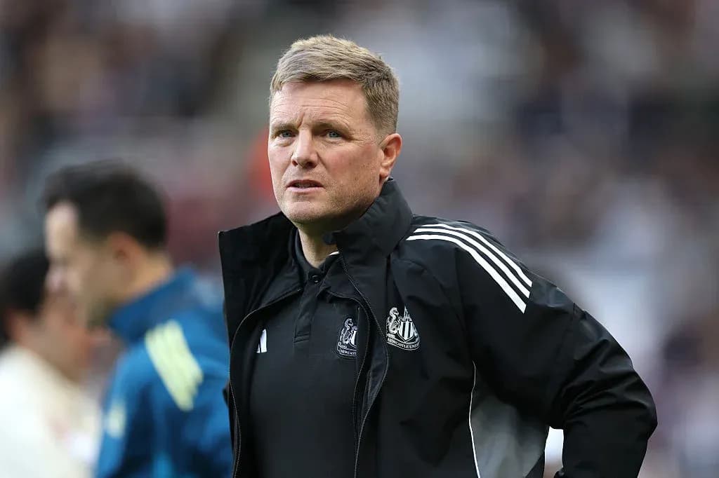 Newcastle manager observing match from sidelines Newcastle manager observing match from sidelines