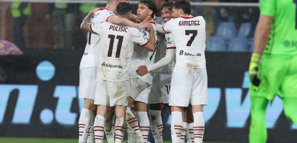 AC Milan players celebrating a goal AC Milan players celebrating a goal
