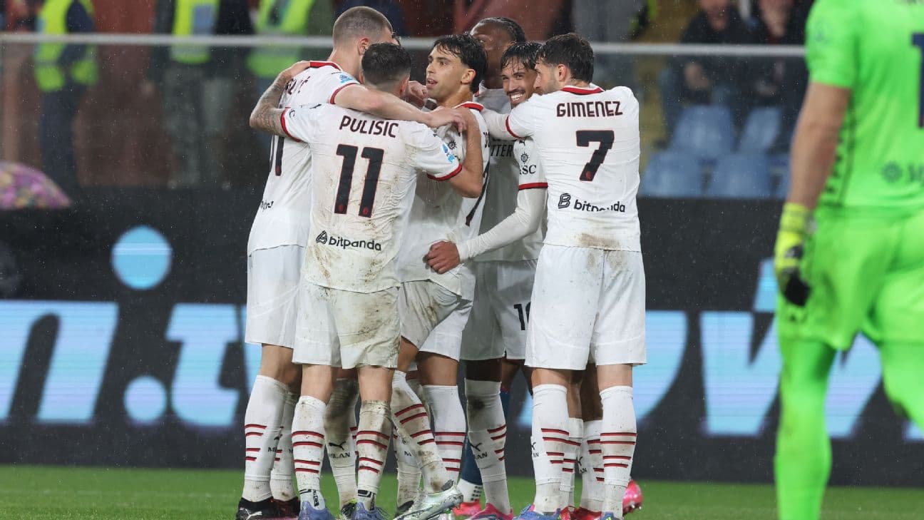 AC Milan players celebrating a goal AC Milan players celebrating a goal