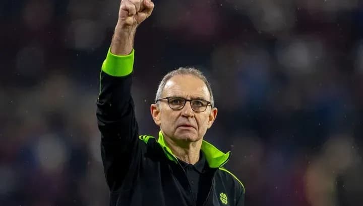 Manager raising fist in celebration after match Manager raising fist in celebration after match