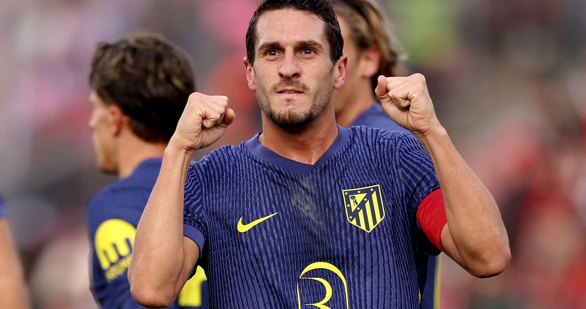 Atletico Madrid player celebrating after a goal Atletico Madrid player celebrating after a goal
